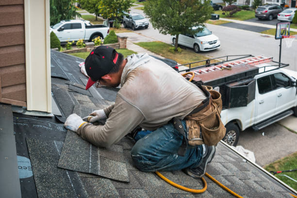 Professional Roofing technician working in Weems, VA